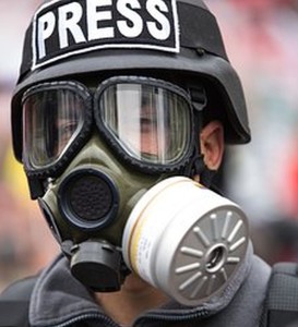 reporter in gas mask