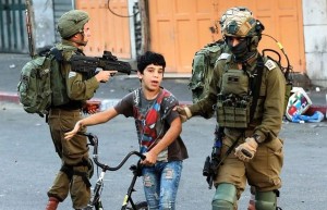 soldiers escorting Palestinianchild