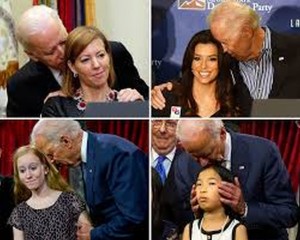 Biden sniffing hair