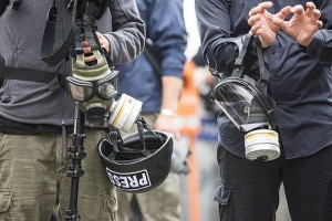 reporters w gas masks