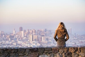 woman facing skyline