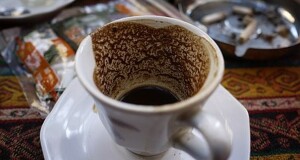 Immigrant Pretends To Enjoy Gritty, Sludgy Turkish Coffee